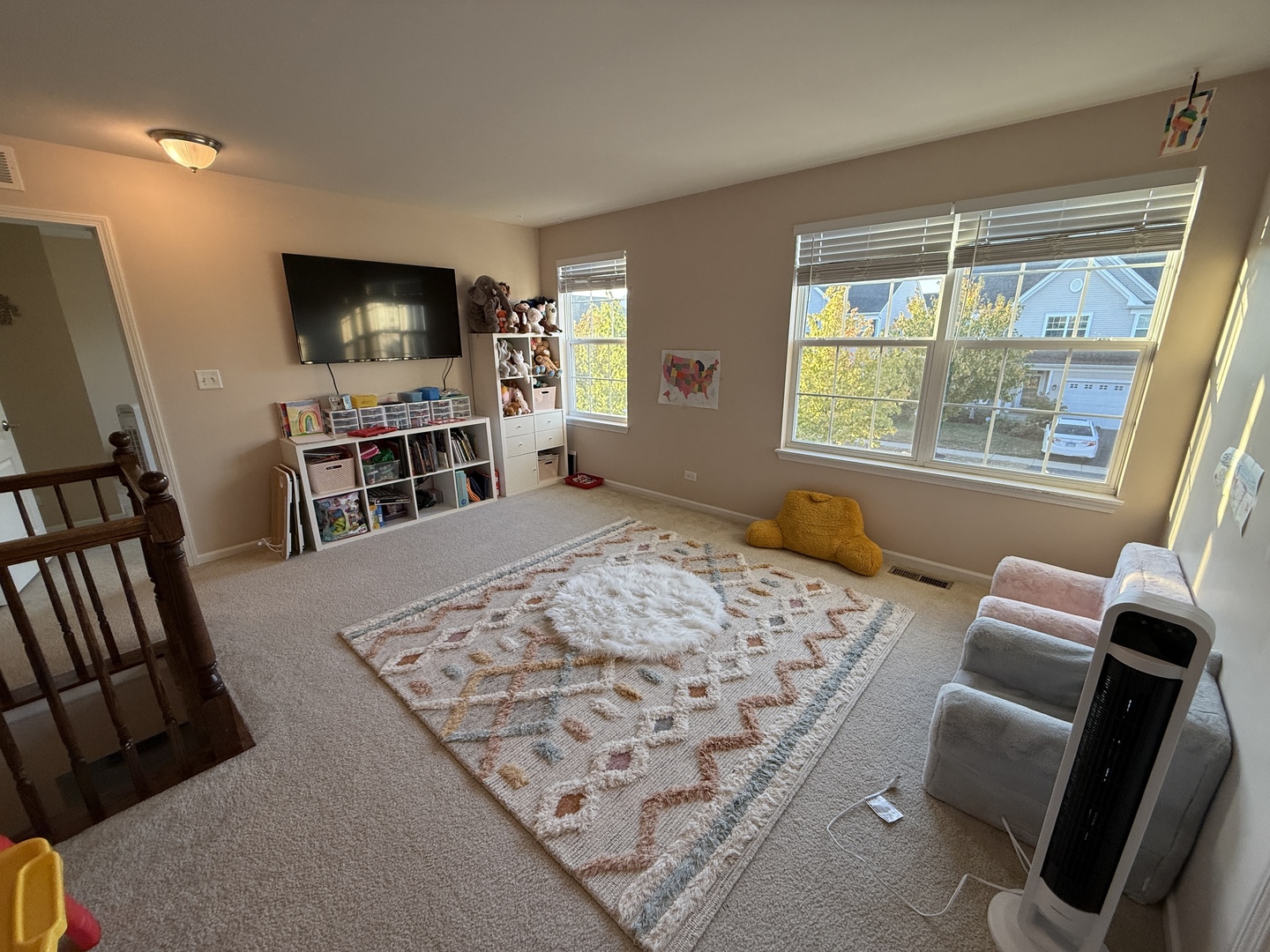 2572 Retreat Circle Lisle, IL 60532 - Photo 21 of 40 a living room with furniture and a flat screen tv