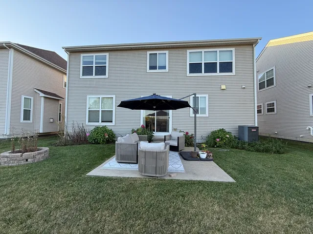 a view of a lake with houses in the back