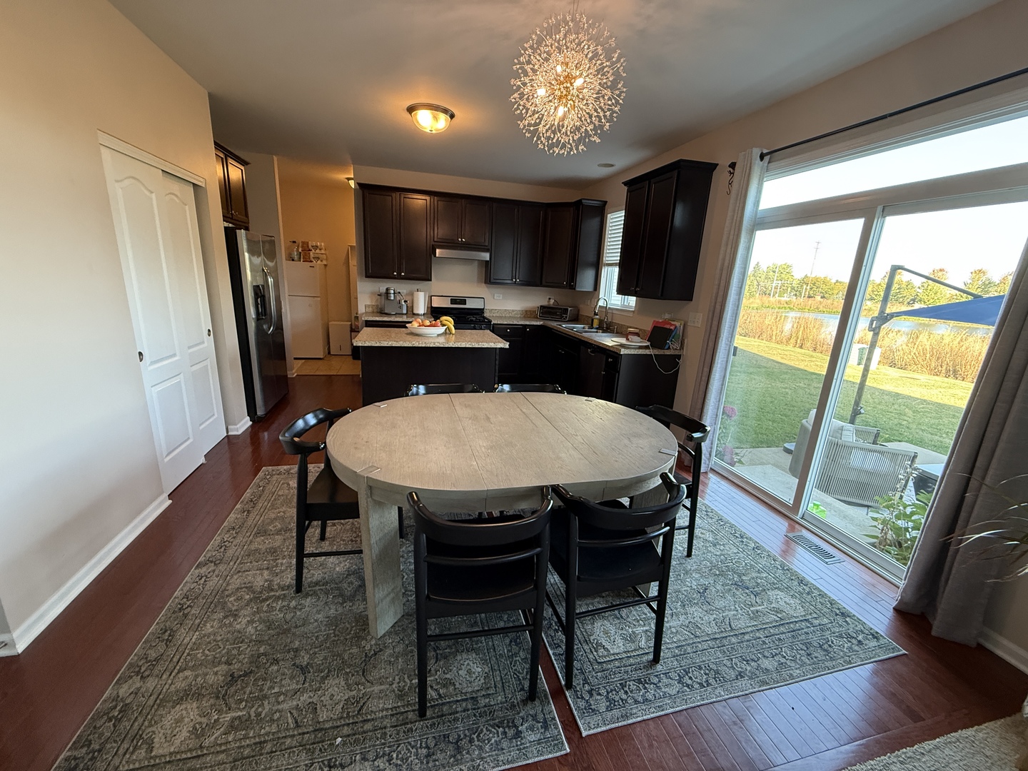 2572 Retreat Circle Lisle, IL 60532 - Photo 7 of 40 a view of a dining room with furniture window and wooden floor