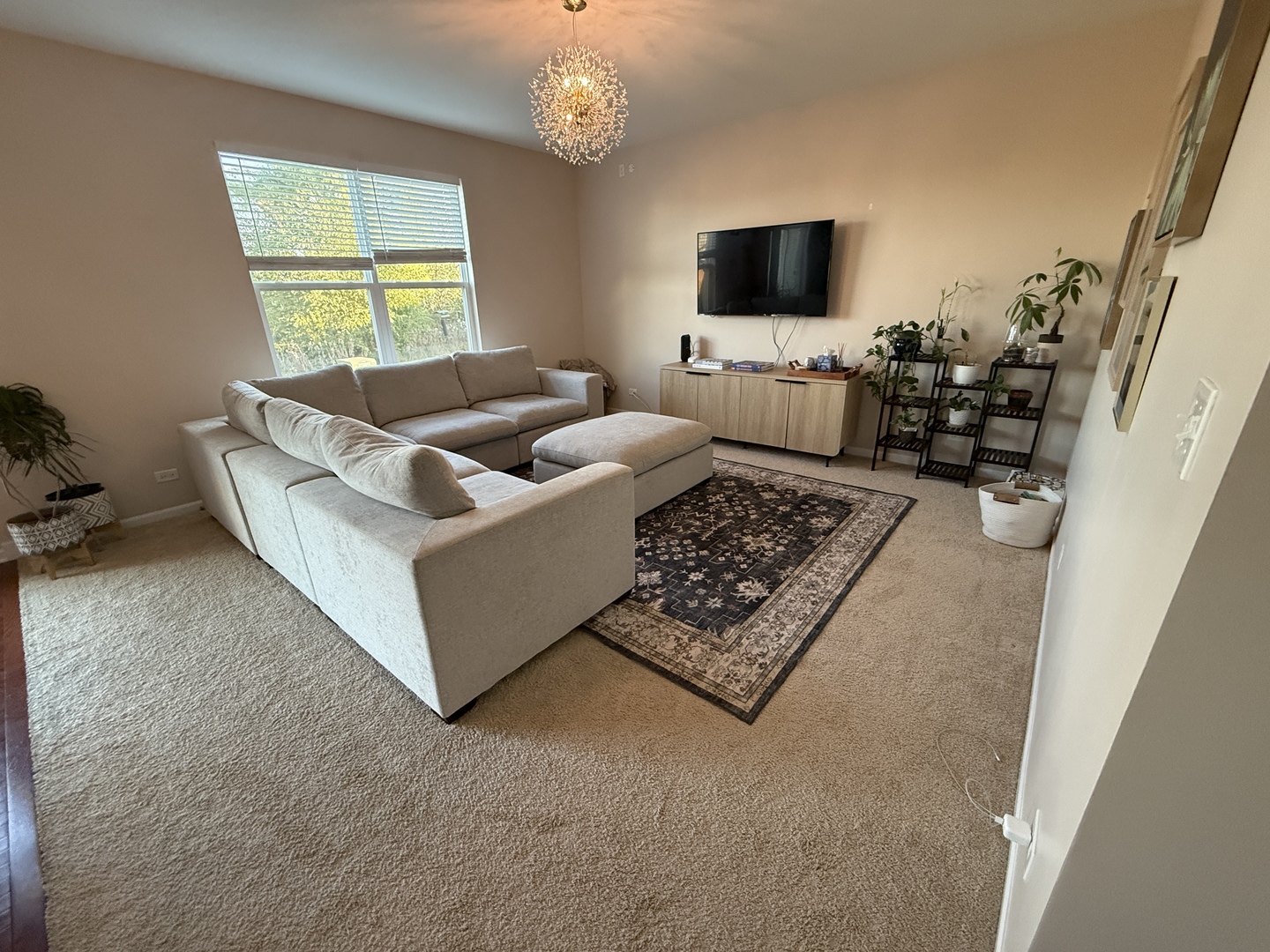 2572 Retreat Circle Lisle, IL 60532 - Photo 10 of 40 a living room with furniture and a flat screen tv