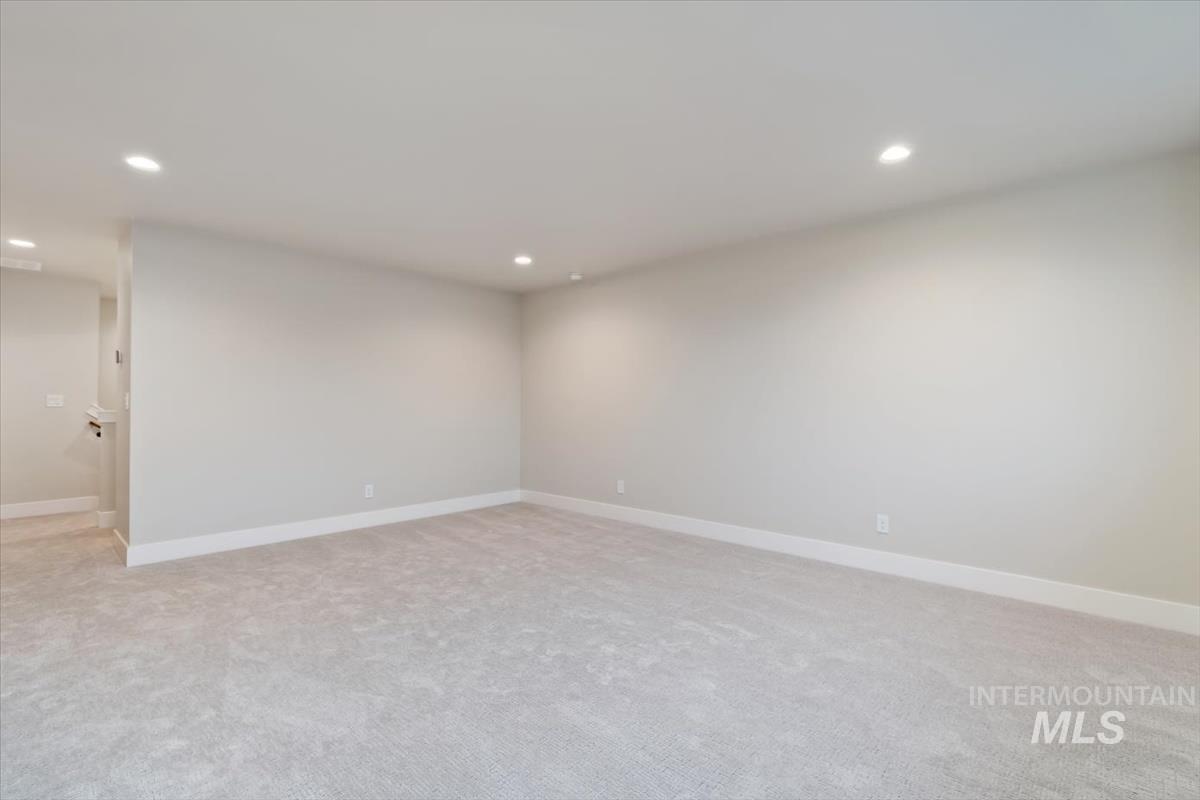 2147 East Blakehurst Avenue Kuna, ID 83634 - Photo 33 of 43 Unfurnished room featuring recessed lighting and light carpet