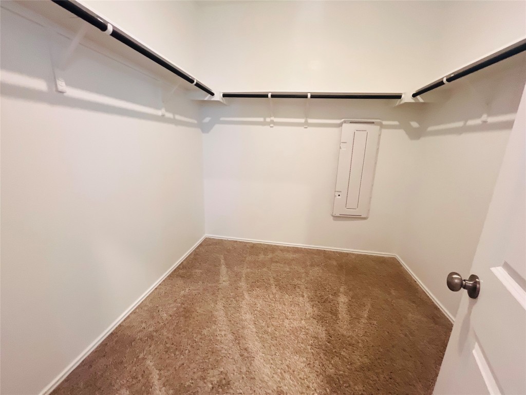 325 Geode Glen Maxwell, TX 78656 - Photo 15 of 28 Spacious closet with carpet flooring and electric panel