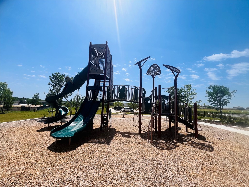 325 Geode Glen Maxwell, TX 78656 - Photo 4 of 28 View of communal playground