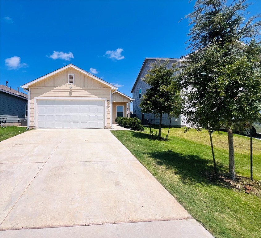 325 Geode Glen Maxwell, TX 78656 - Photo 6 of 28 a front view of a house with a yard