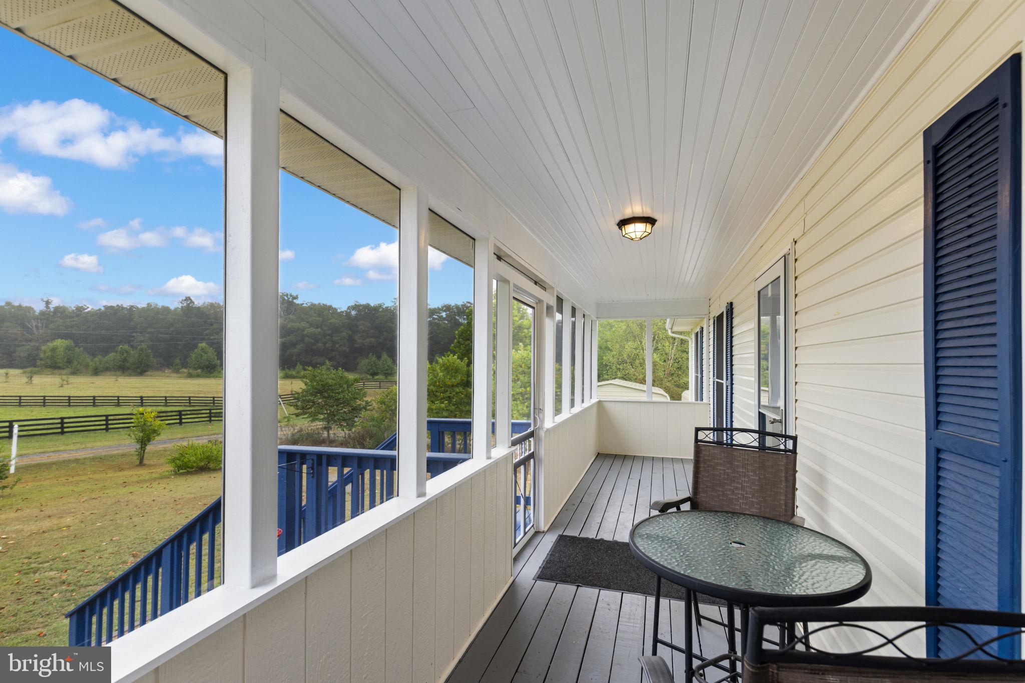 9178 Hannah Dustin Catlett, VA 20119 - Photo 35 of 54 a balcony with table and chairs