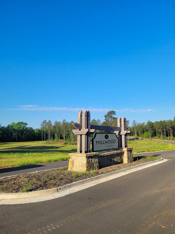 228 Millwood Loop, Unit 38 Minden, LA 71055 - Photo 14 of 14 a view of a street with a building in the background