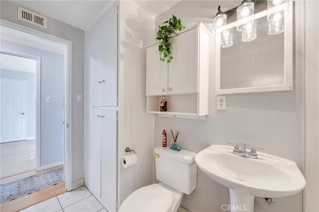 a bedroom with bed and a window