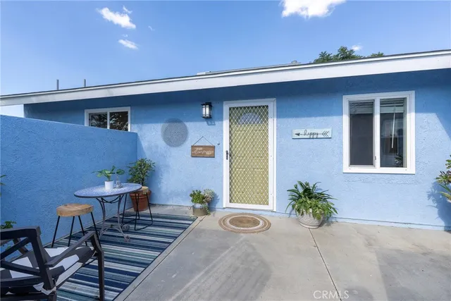 a view of a yard with a patio