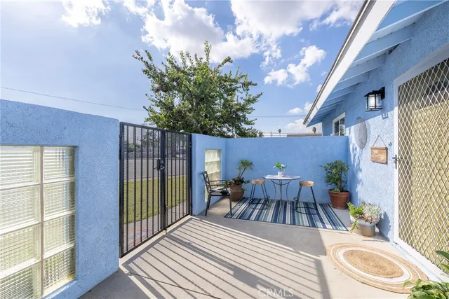 a view of yard with swimming pool and green space