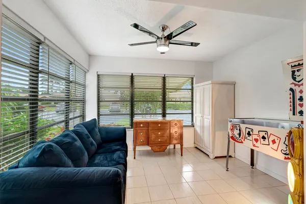 a living room with furniture and a window