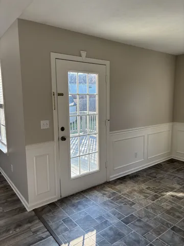 an empty room with windows