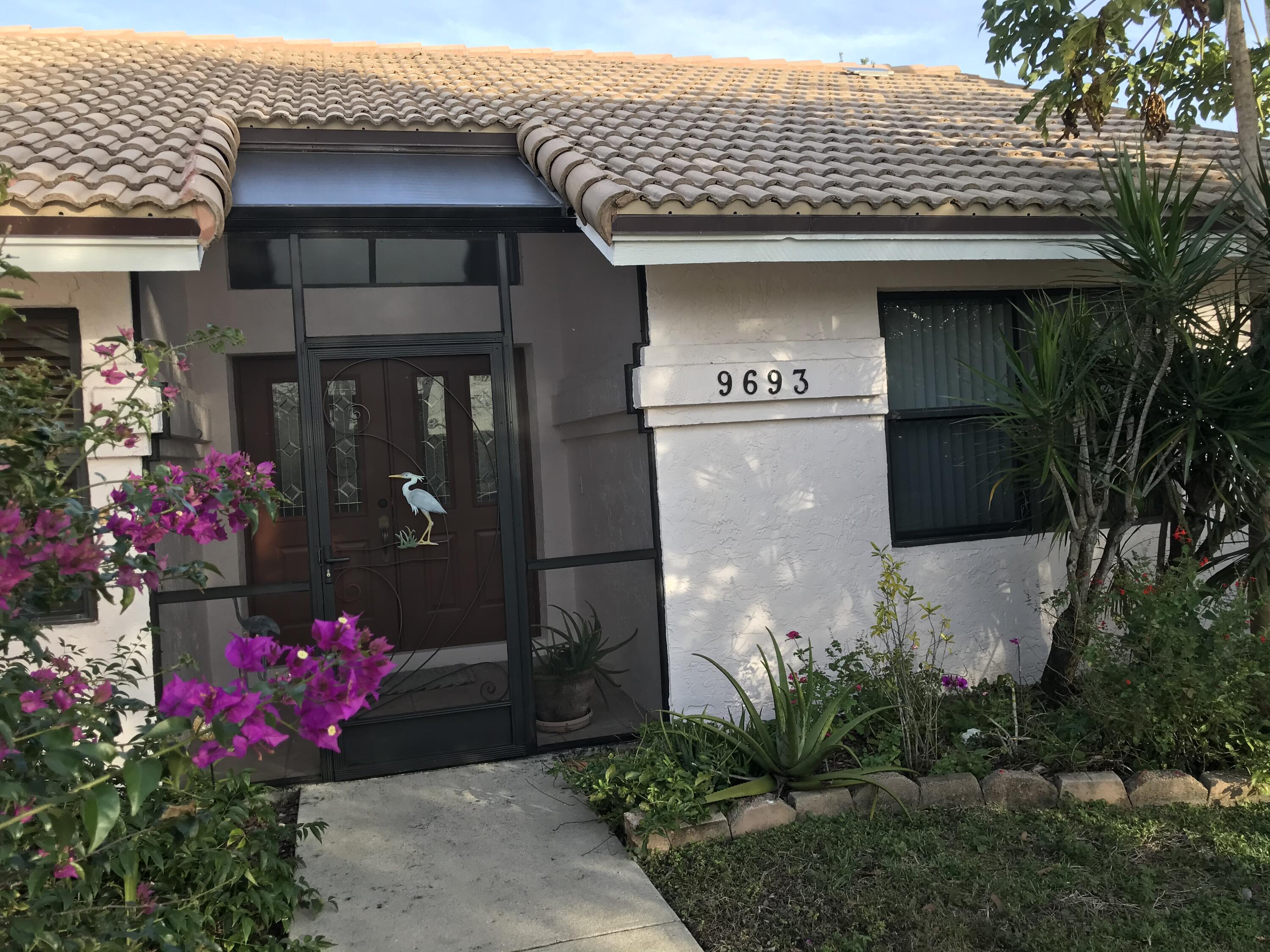9693 El Clair Ranch Road Boynton Beach, FL 33437 - Photo 6 of 9 Front entrance