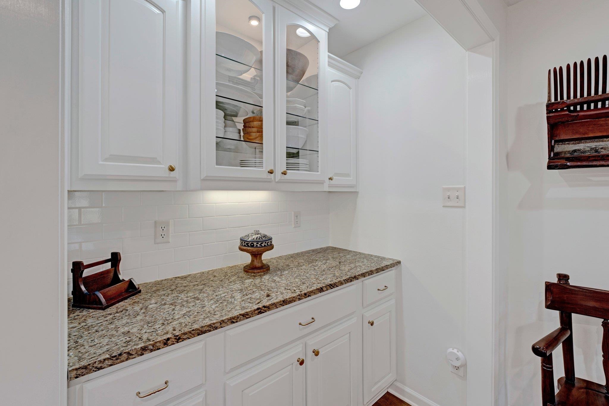 5481 Walnut Grove Road Memphis, TN 38120 - Photo 14 of 40 a kitchen with stainless steel appliances granite countertop a sink and cabinets