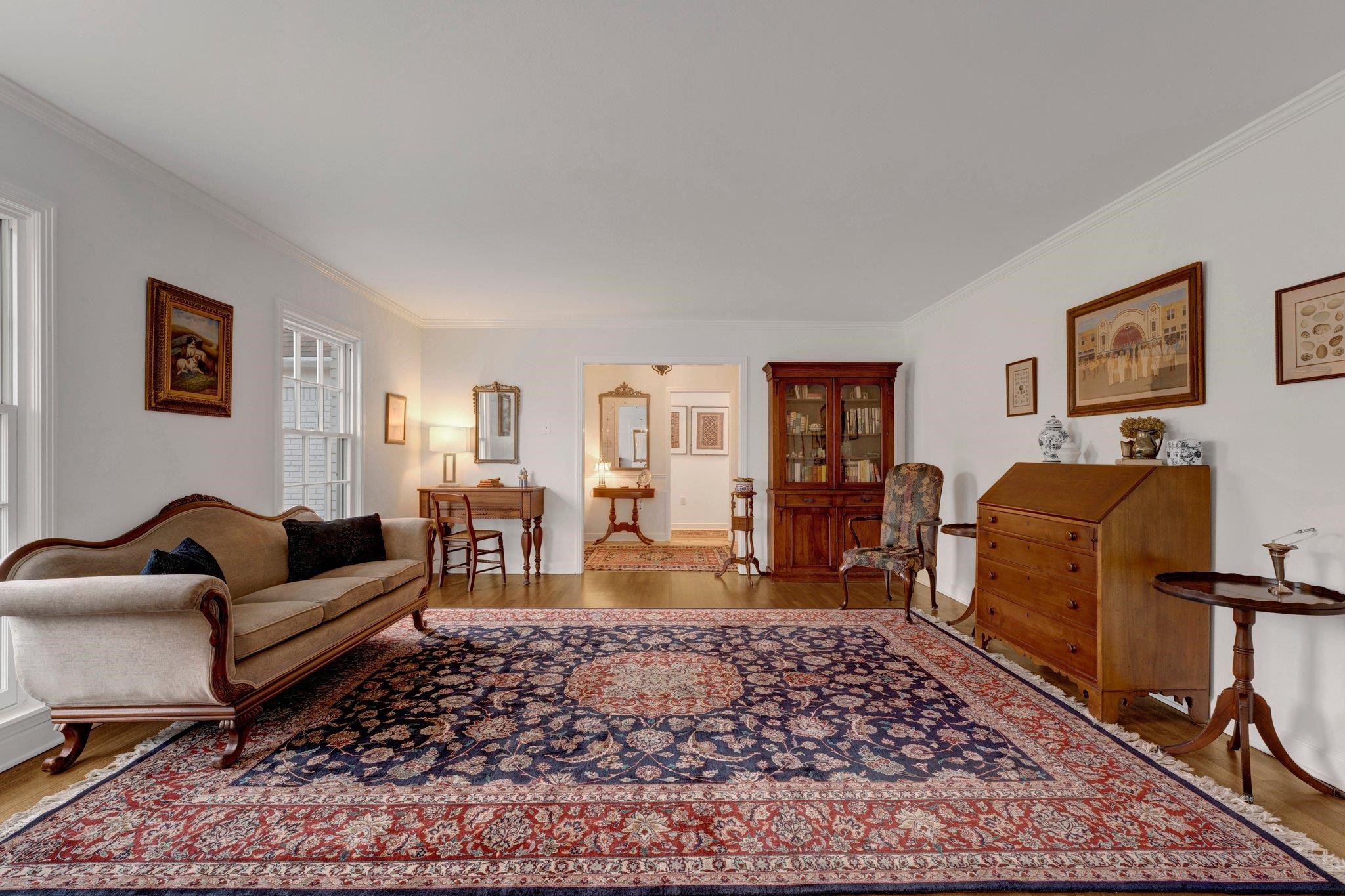 5481 Walnut Grove Road Memphis, TN 38120 - Photo 21 of 40 a living room with furniture and a rug