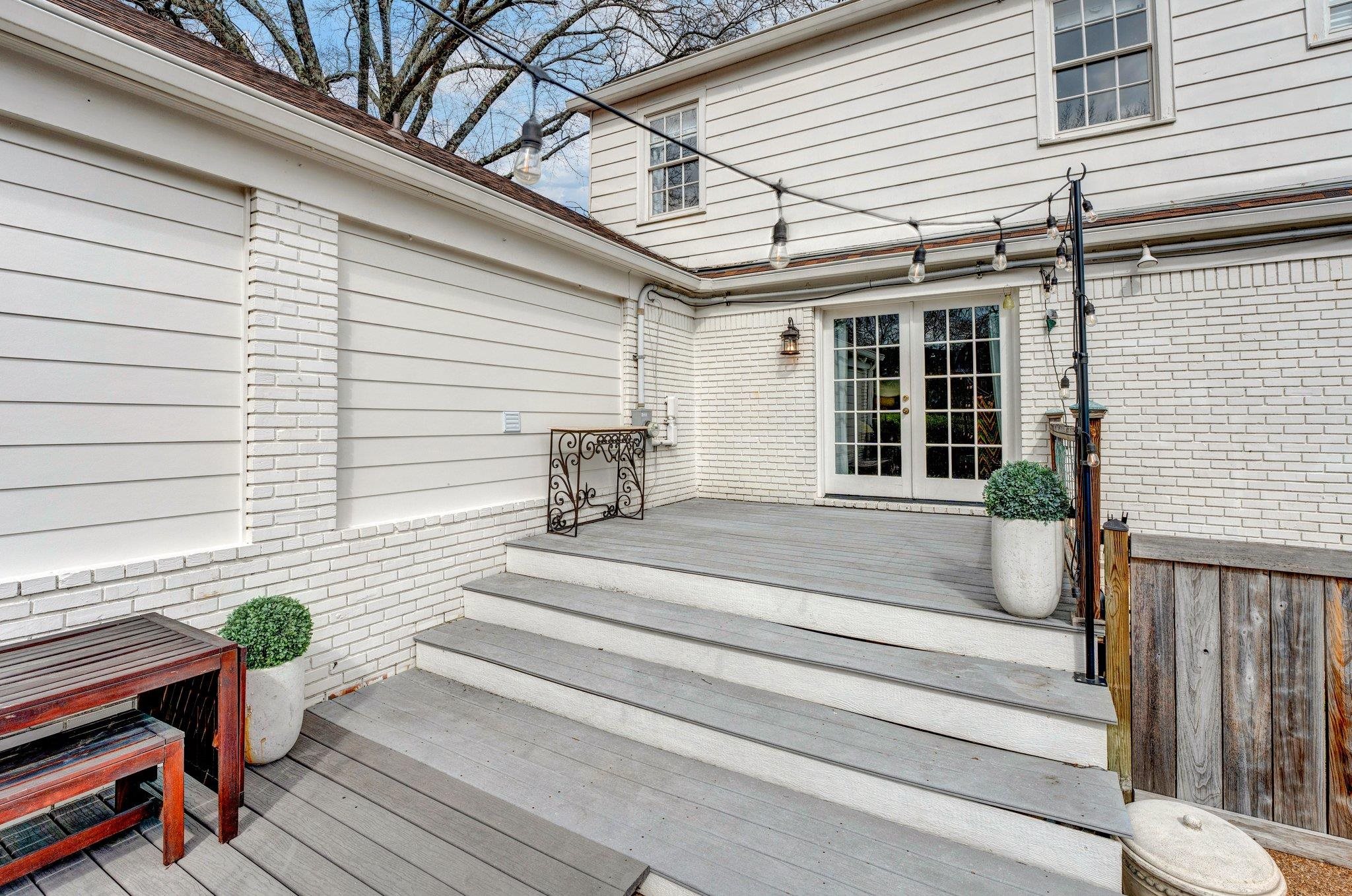 5481 Walnut Grove Road Memphis, TN 38120 - Photo 38 of 40 a front view of a house with a table and chairs