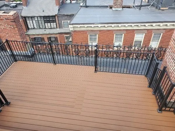 a view of balcony with wooden floor