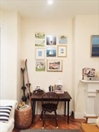 a view of a workspace with furniture