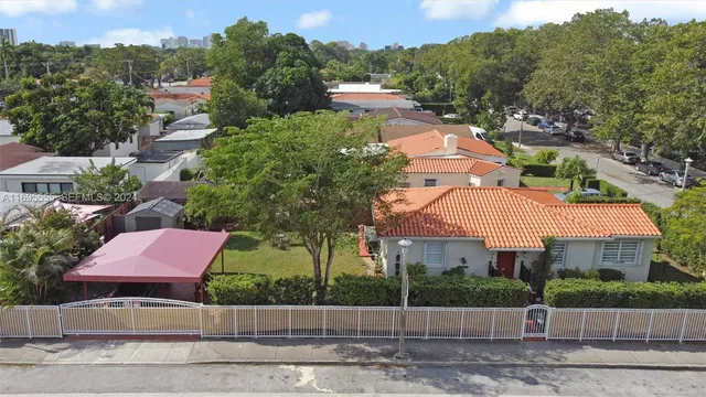 an aerial view of a city with lots of residential buildings