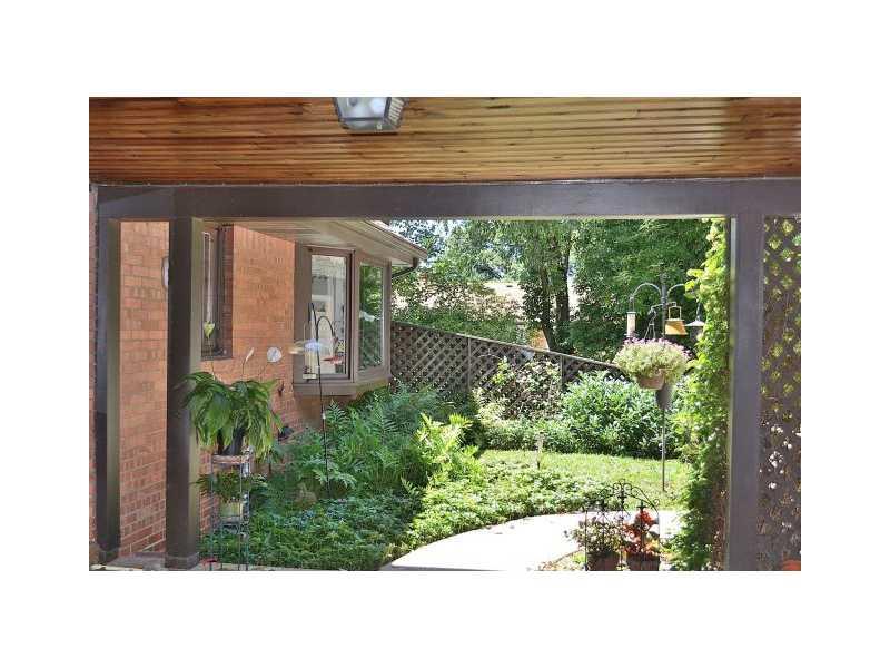 426 Sangree Road Pittsburgh, PA 15237 - Photo 21 of 25 Patio/Deck. The breezeway is more than a practical passage from garage to house, it is a perfect place to relax and enjoy the beautiful private yard at any time of the day.