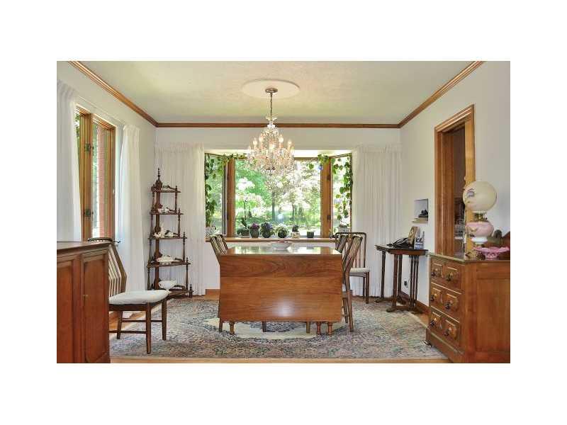 426 Sangree Road Pittsburgh, PA 15237 - Photo 7 of 25 Dining Room. The focal point of the dining room is the beautiful bay window, highlighted by the Austrian crystal chandelier.