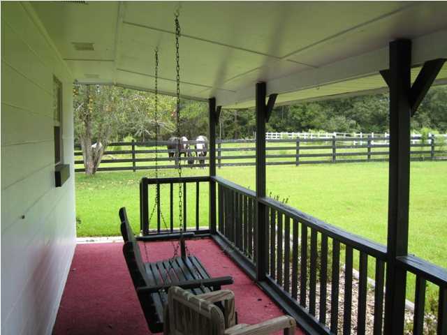 1517 Hester Church Road Baker, FL 32531 - Photo 23 of 28 a view of two chairs in the balcony