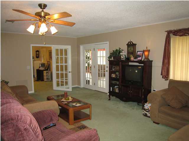 1517 Hester Church Road Baker, FL 32531 - Photo 5 of 28 a living room with furniture and a window