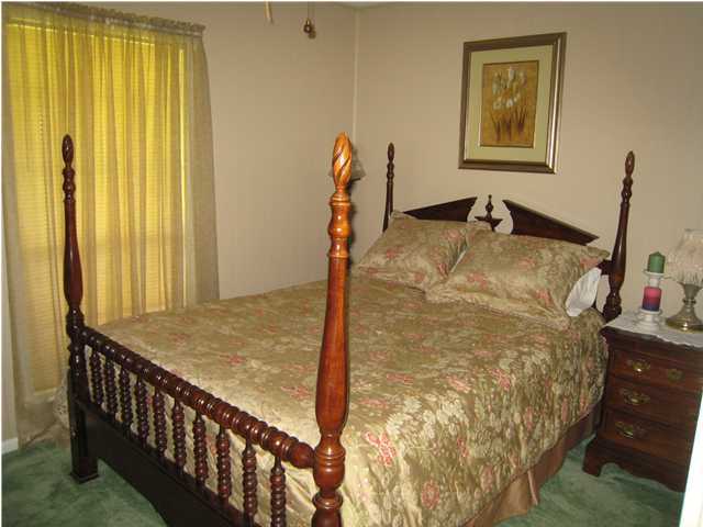 1517 Hester Church Road Baker, FL 32531 - Photo 10 of 28 a bed room with a bed