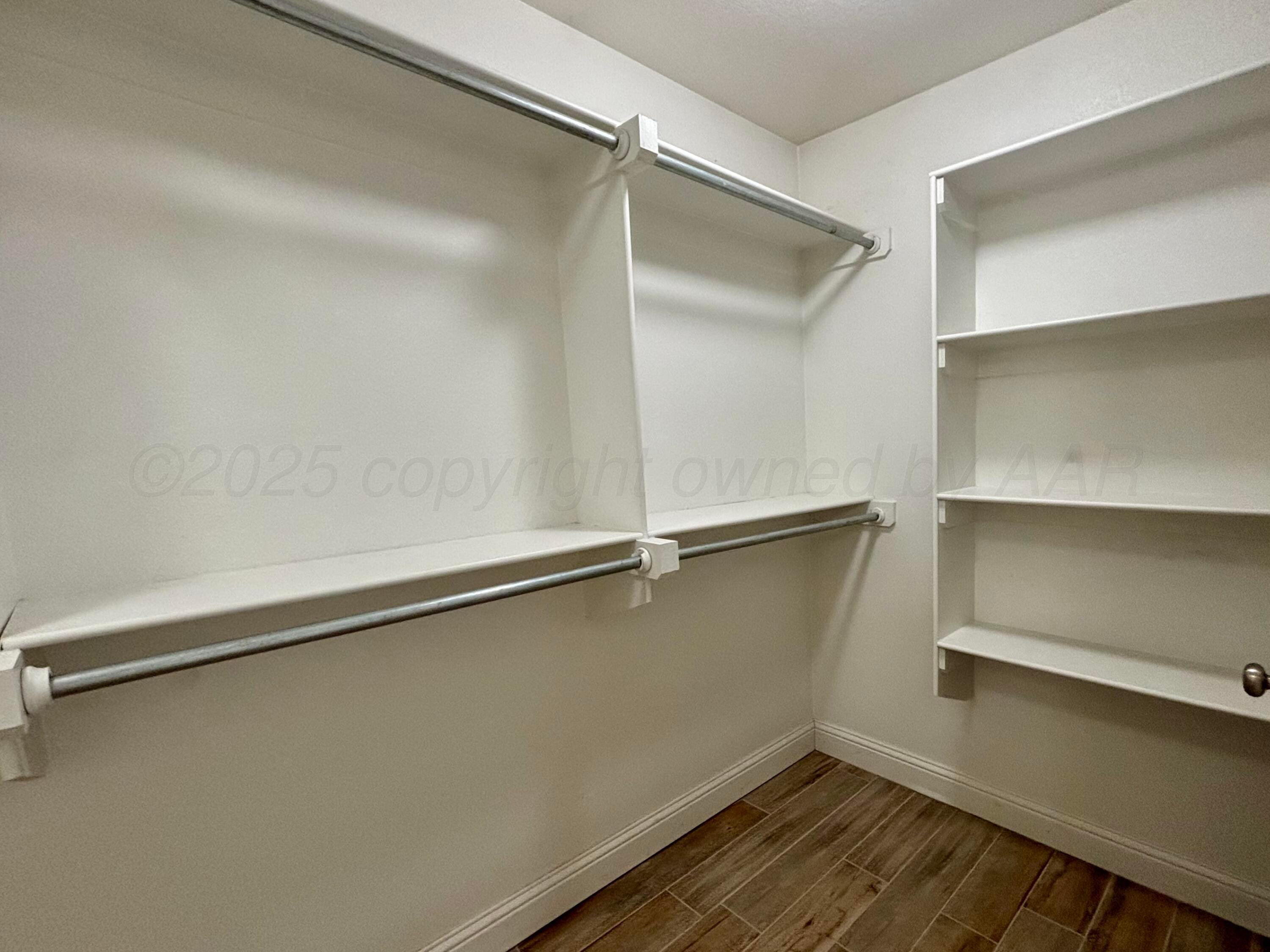 9407 Cagle Drive Amarillo, TX 79119 - Photo 15 of 20 a room with walk in closet