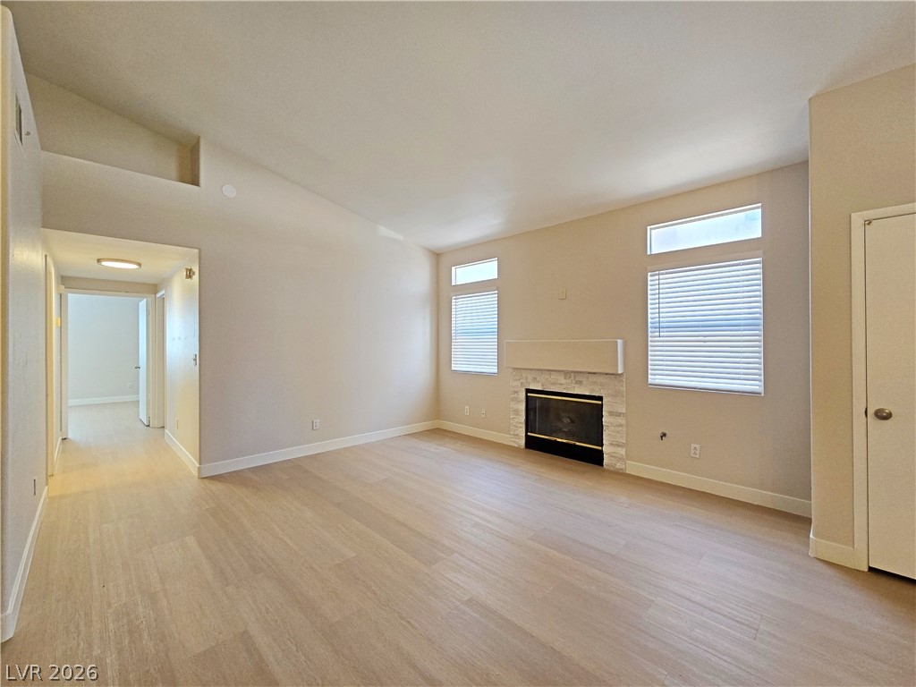 5370 Runningbrook Road Las Vegas, NV 89120 - Photo 15 of 30 An inviting great room with soaring vaulted ceilings and a classic fireplace.