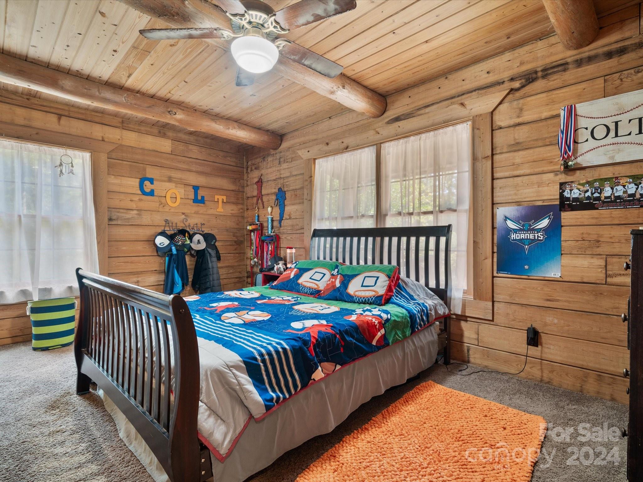 674 Ormond Road York, SC 29745 - Photo 14 of 48 a bedroom with a bed and a baby crib