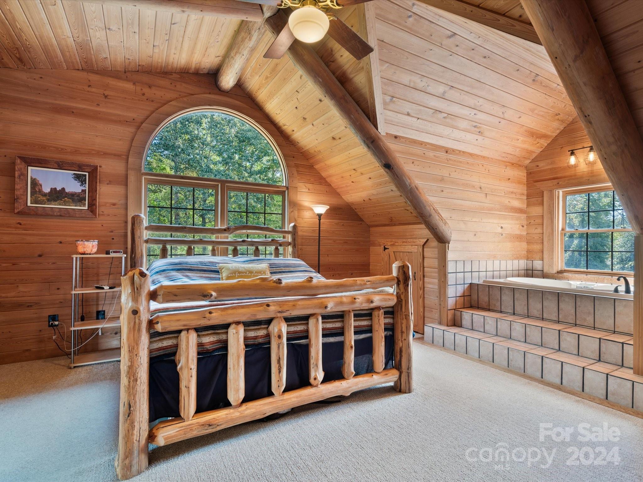 674 Ormond Road York, SC 29745 - Photo 20 of 48 a bedroom with a bed and a large window