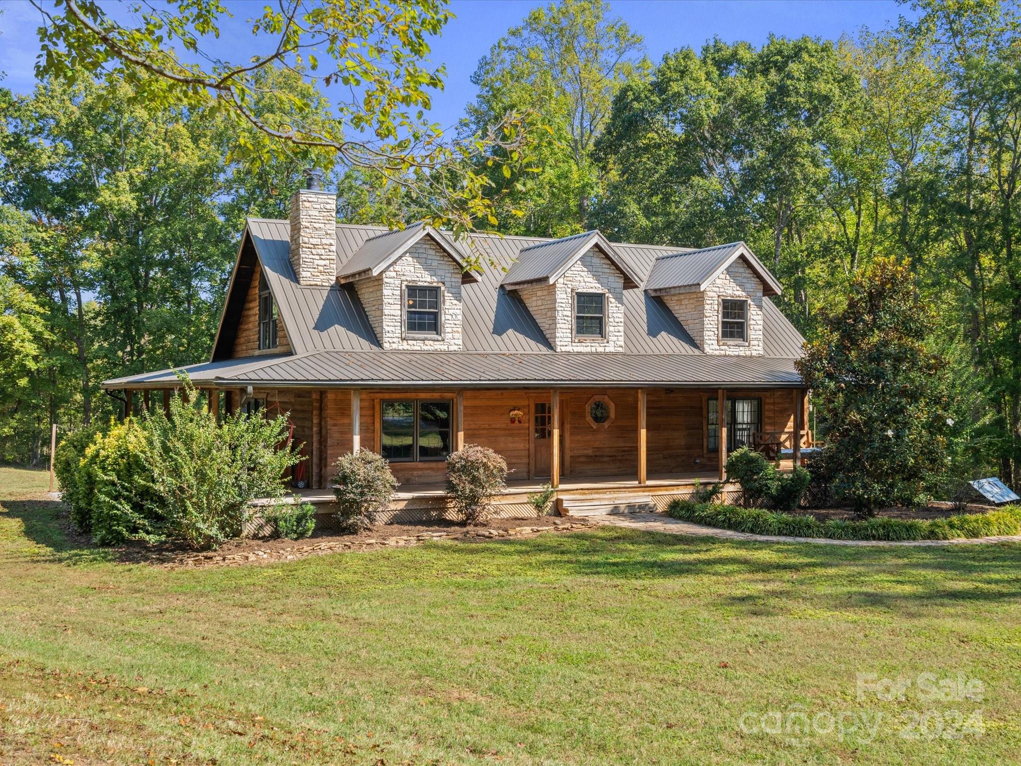 674 Ormond Road York, SC 29745 - Photo 2 of 48 a front view of a house with garden