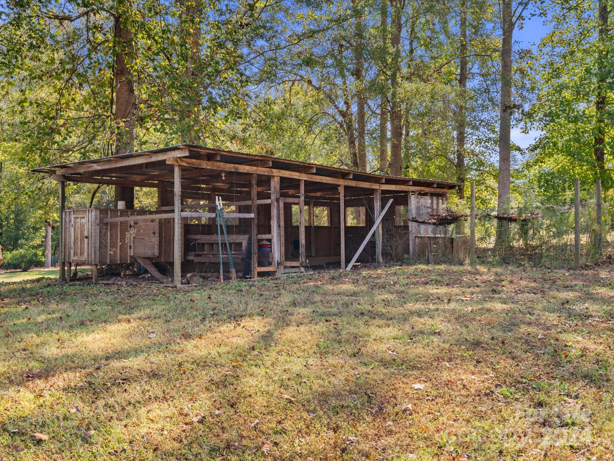 674 Ormond Road York, SC 29745 - Photo 39 of 48 a view of a wooden house with wooden fence