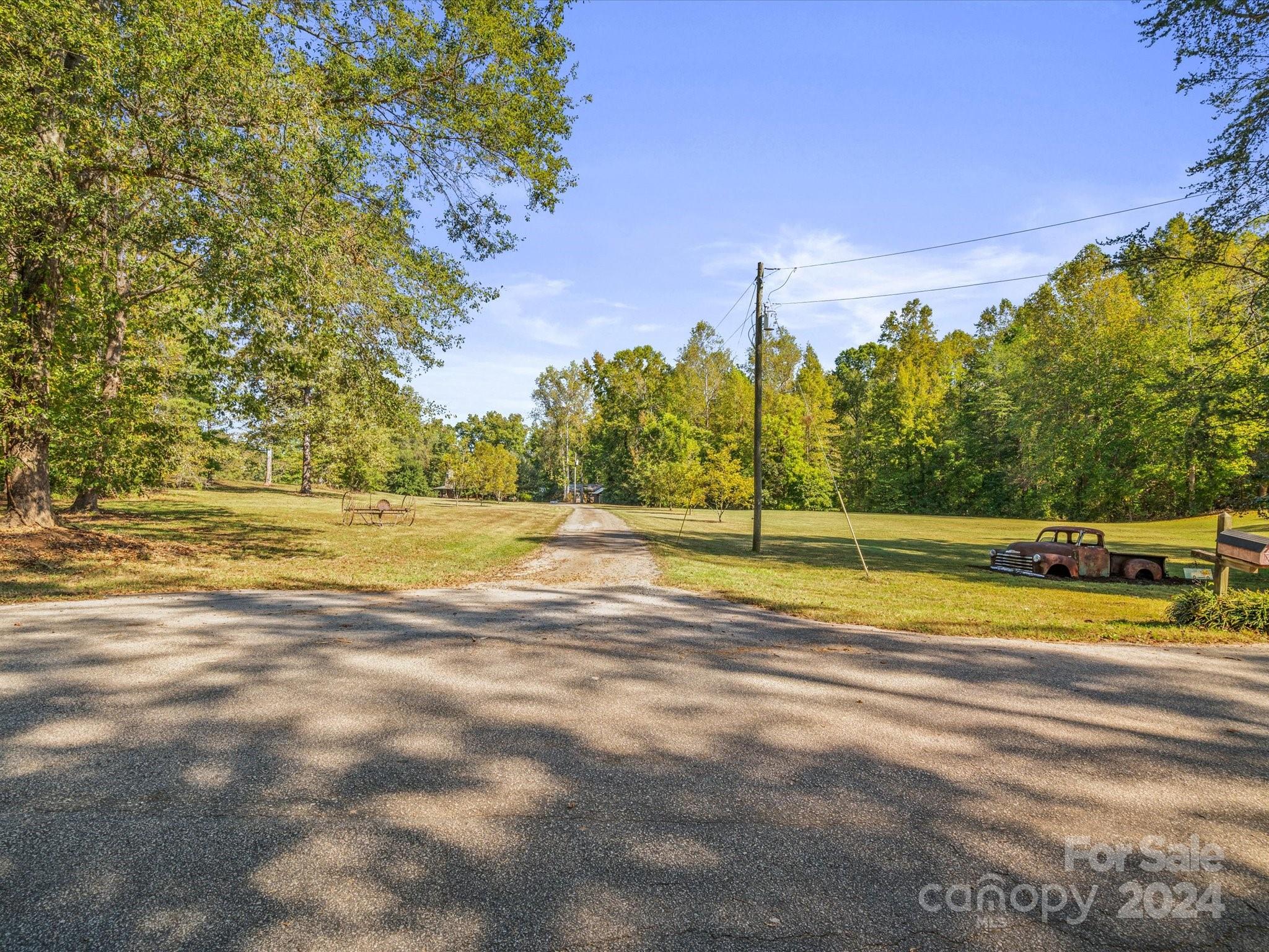 674 Ormond Road York, SC 29745 - Photo 40 of 48 a view of a swimming pool with an outdoor space and seating area