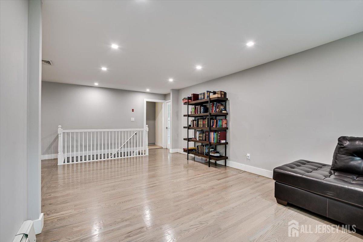 28 Clark Avenue Edison, NJ 08817 - Photo 13 of 47 a view of an empty room with a window
