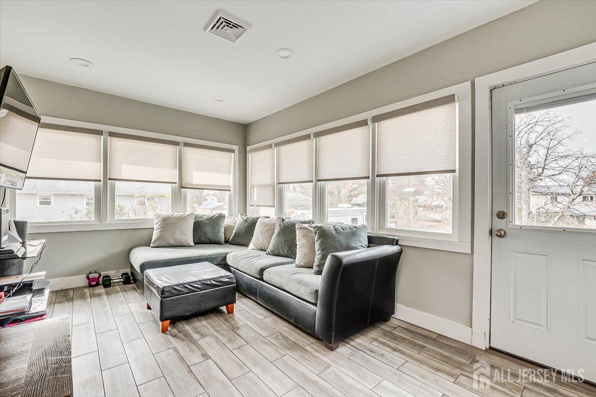 28 Clark Avenue Edison, NJ 08817 - Photo 25 of 47 a living room with furniture and a window