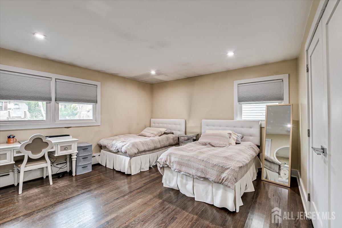 28 Clark Avenue Edison, NJ 08817 - Photo 27 of 47 a bedroom with two beds and a large window