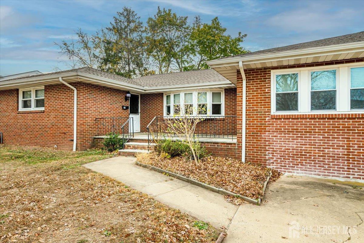 28 Clark Avenue Edison, NJ 08817 - Photo 6 of 47 a front view of a house with garden