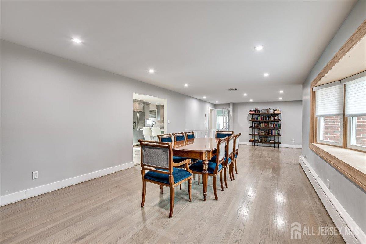 28 Clark Avenue Edison, NJ 08817 - Photo 8 of 47 a view of a dining area with furniture window and wooden floor
