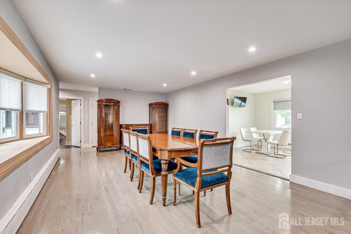 28 Clark Avenue Edison, NJ 08817 - Photo 10 of 47 a dining room with furniture and wooden floor