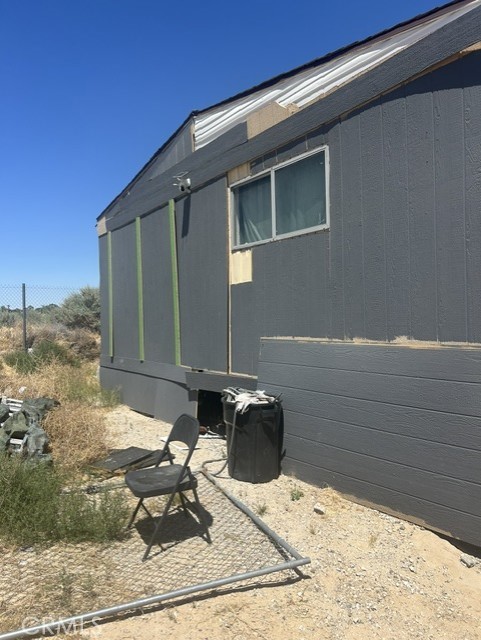 35057 Birch Road Barstow, CA 92311 - Photo 12 of 15 a backyard of a house with table and chairs