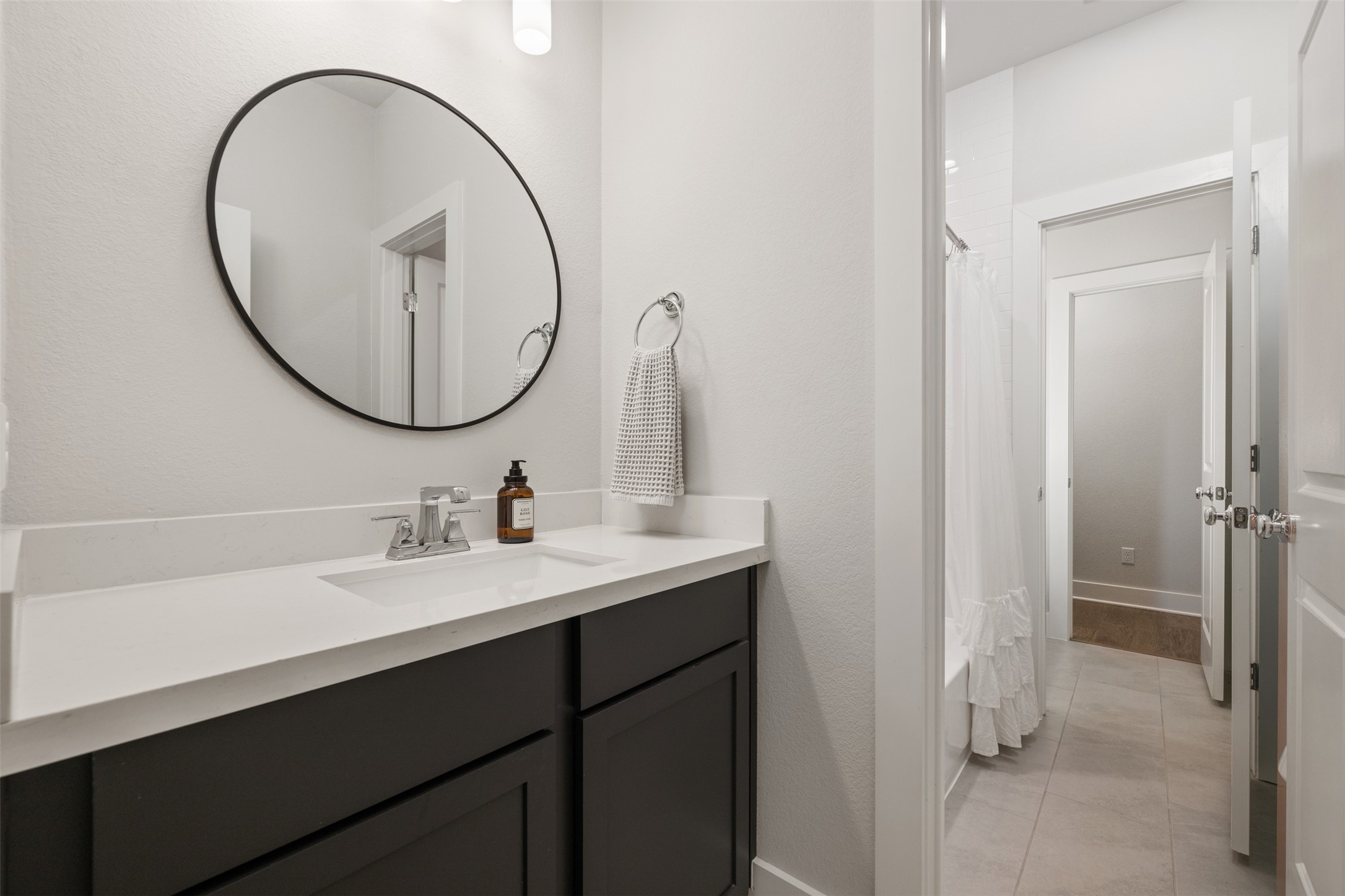 418 Raleigh Drive Georgetown, TX 78633 - Photo 30 of 39 a bathroom with a sink and a mirror