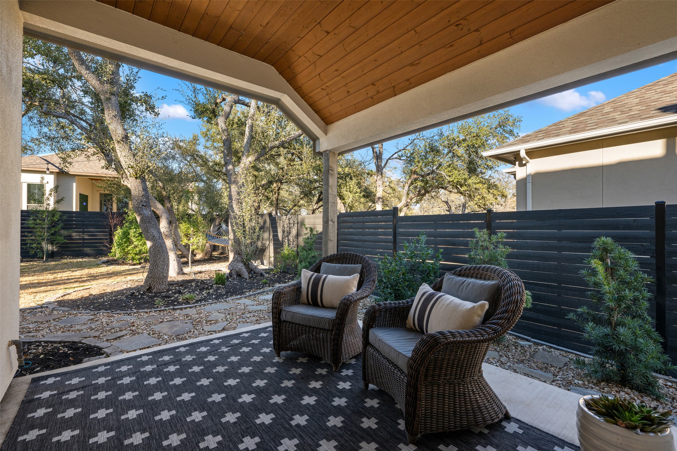 418 Raleigh Drive Georgetown, TX 78633 - Photo 33 of 39 a outdoor living space with patio furniture and a potted plant