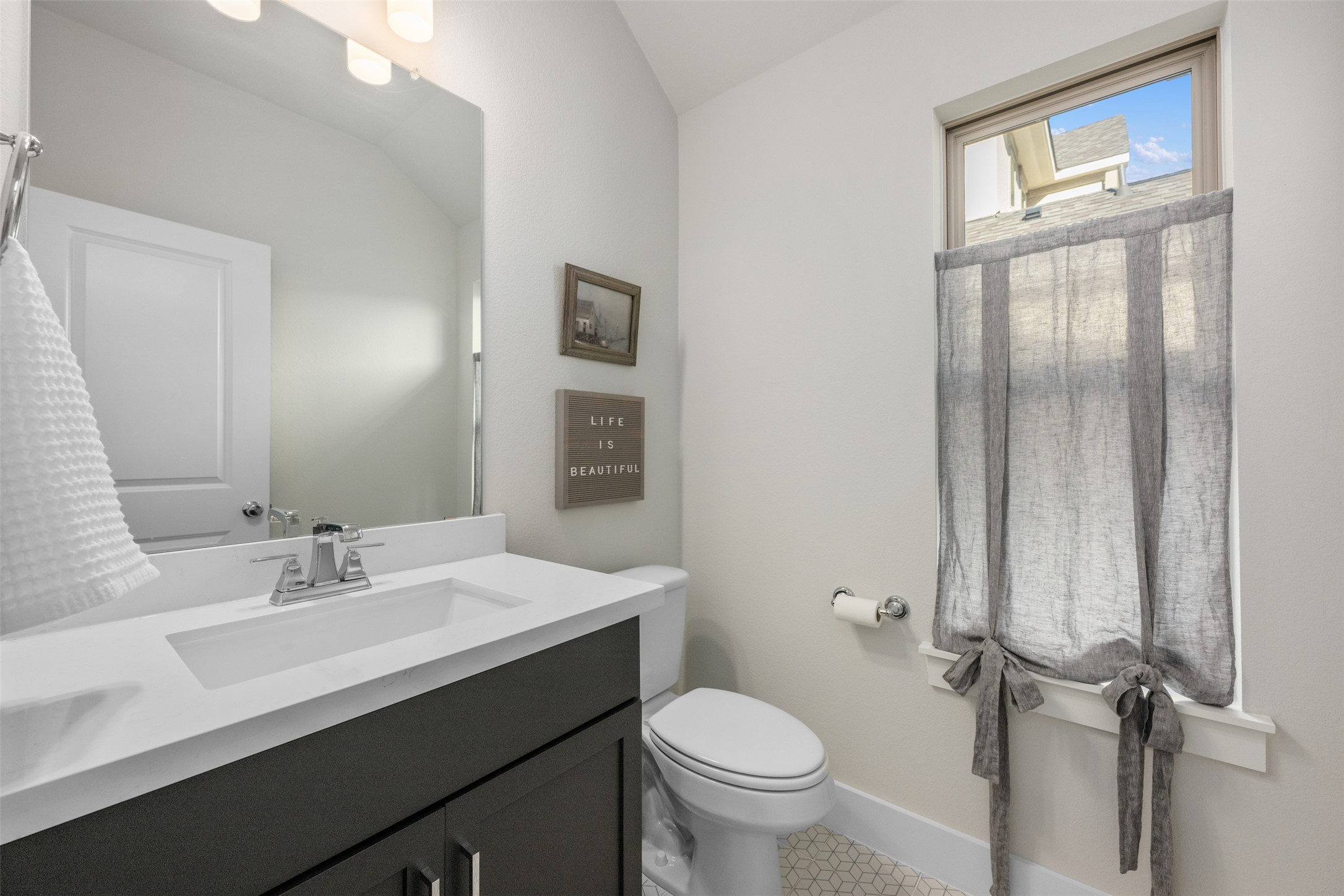 418 Raleigh Drive Georgetown, TX 78633 - Photo 9 of 39 a bathroom with a sink a toilet and shower