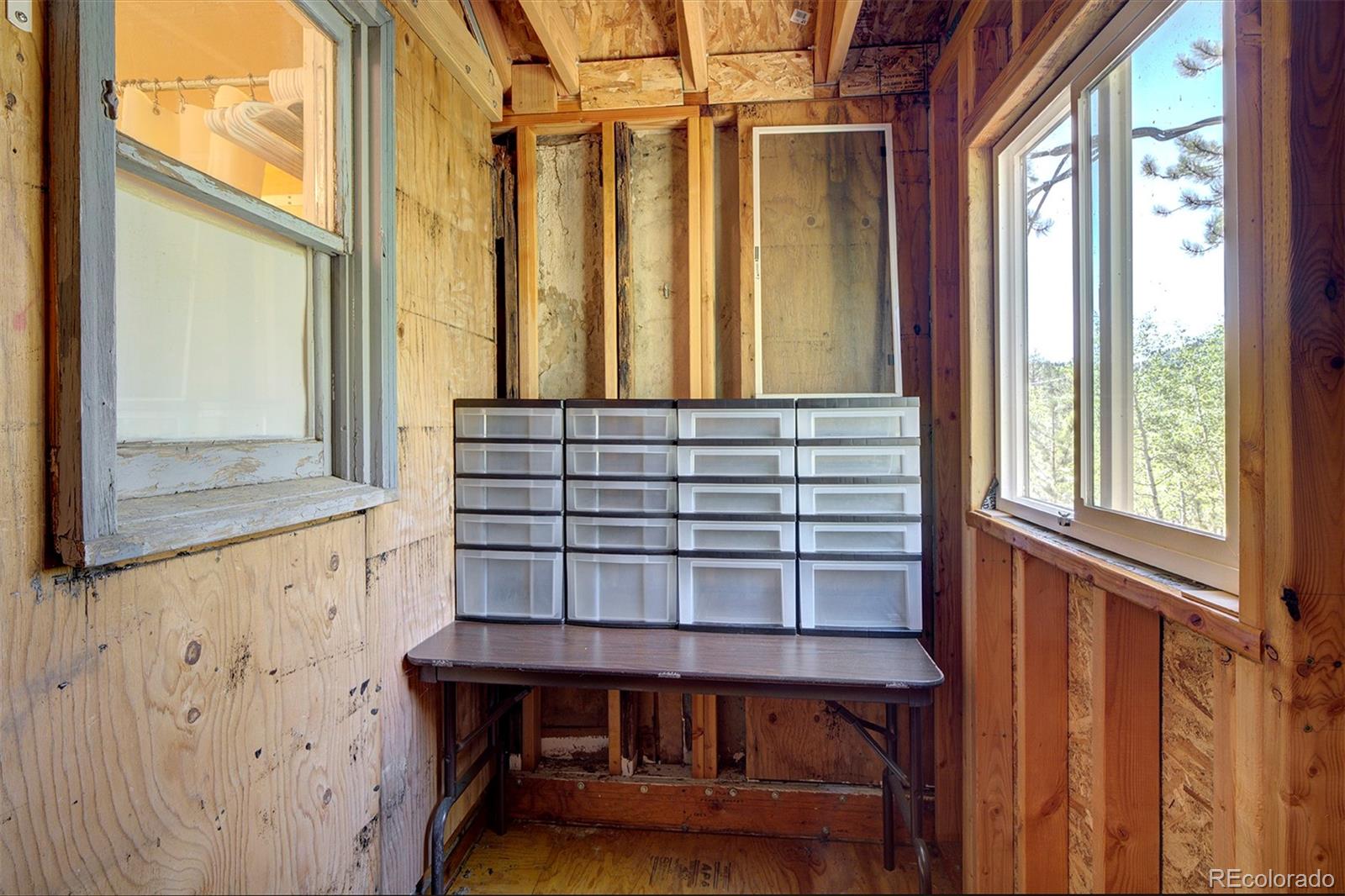 117 Tall Timber Lane Bailey, CO 80421 - Photo 16 of 37 a view of balcony with furniture