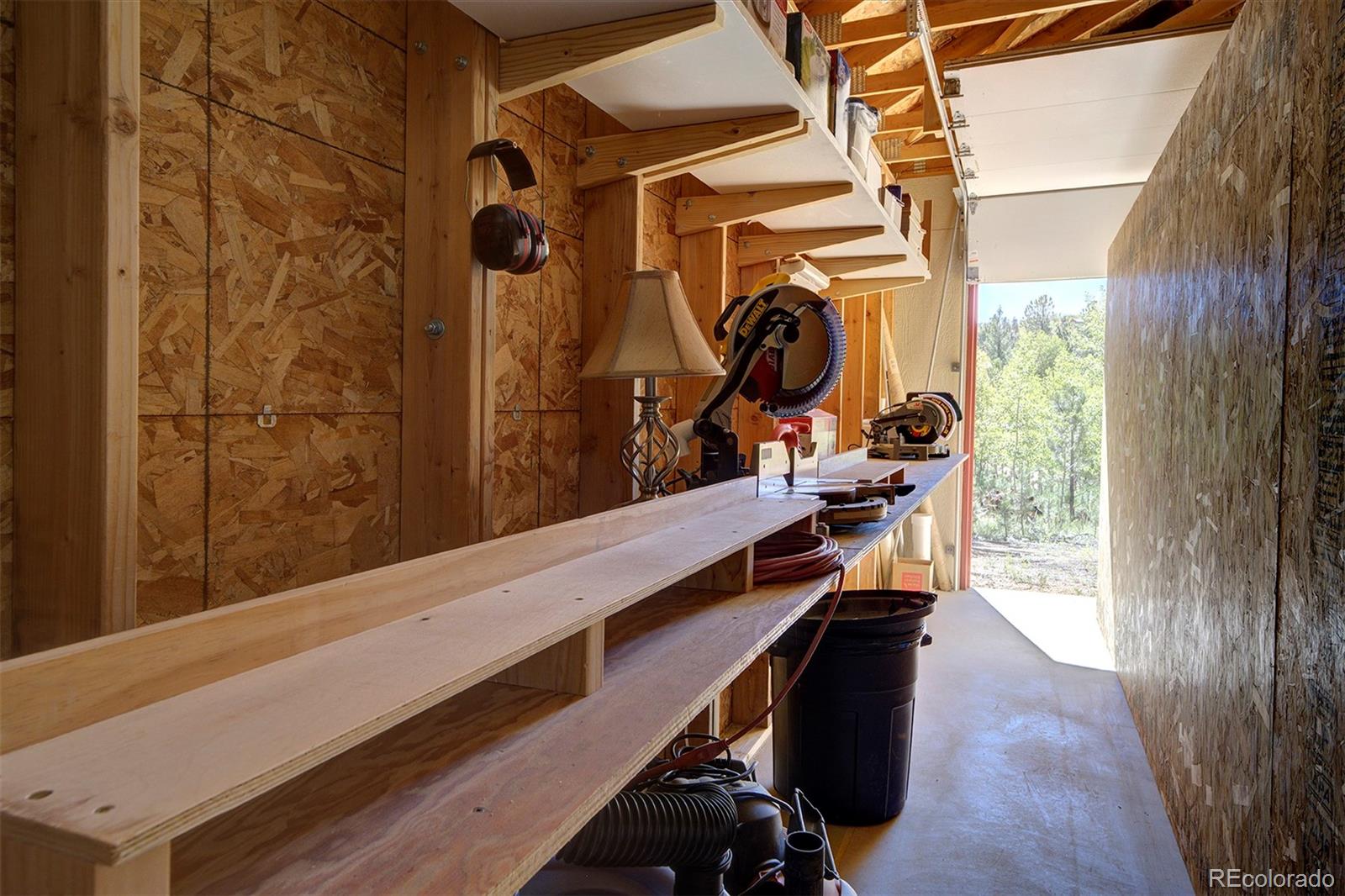 117 Tall Timber Lane Bailey, CO 80421 - Photo 25 of 37 a view of a room with gym equipment
