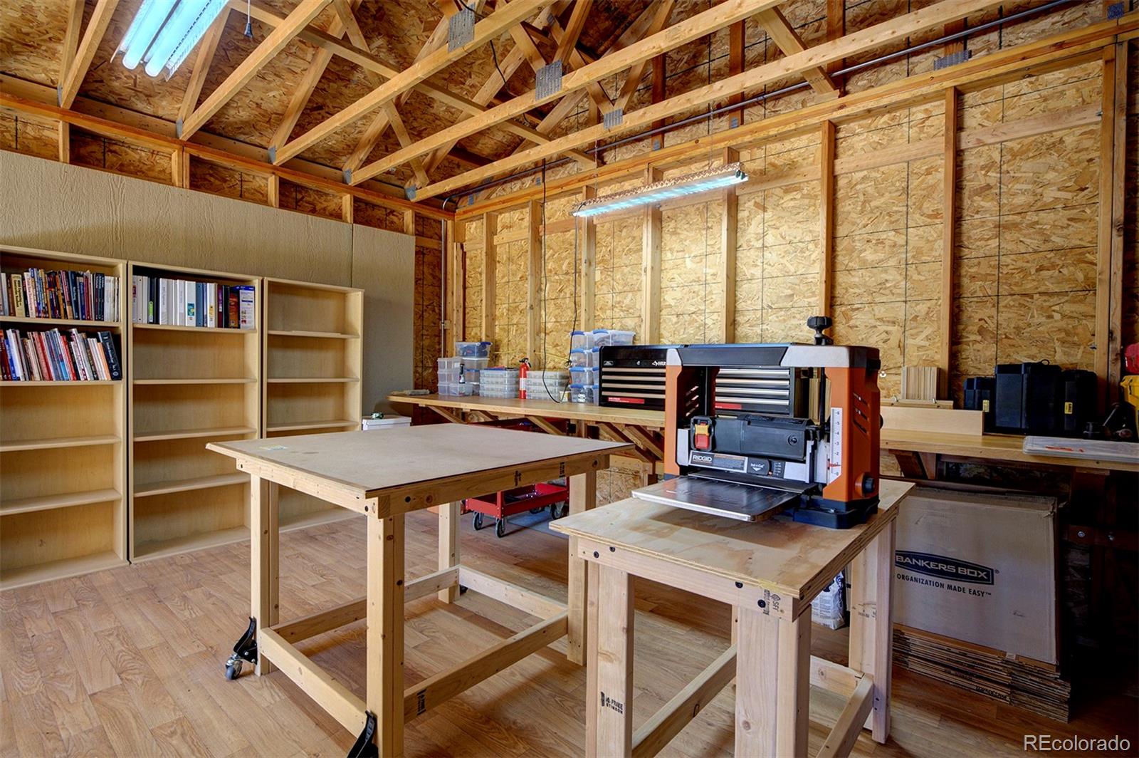 117 Tall Timber Lane Bailey, CO 80421 - Photo 27 of 37 a view of a workspace with furniture