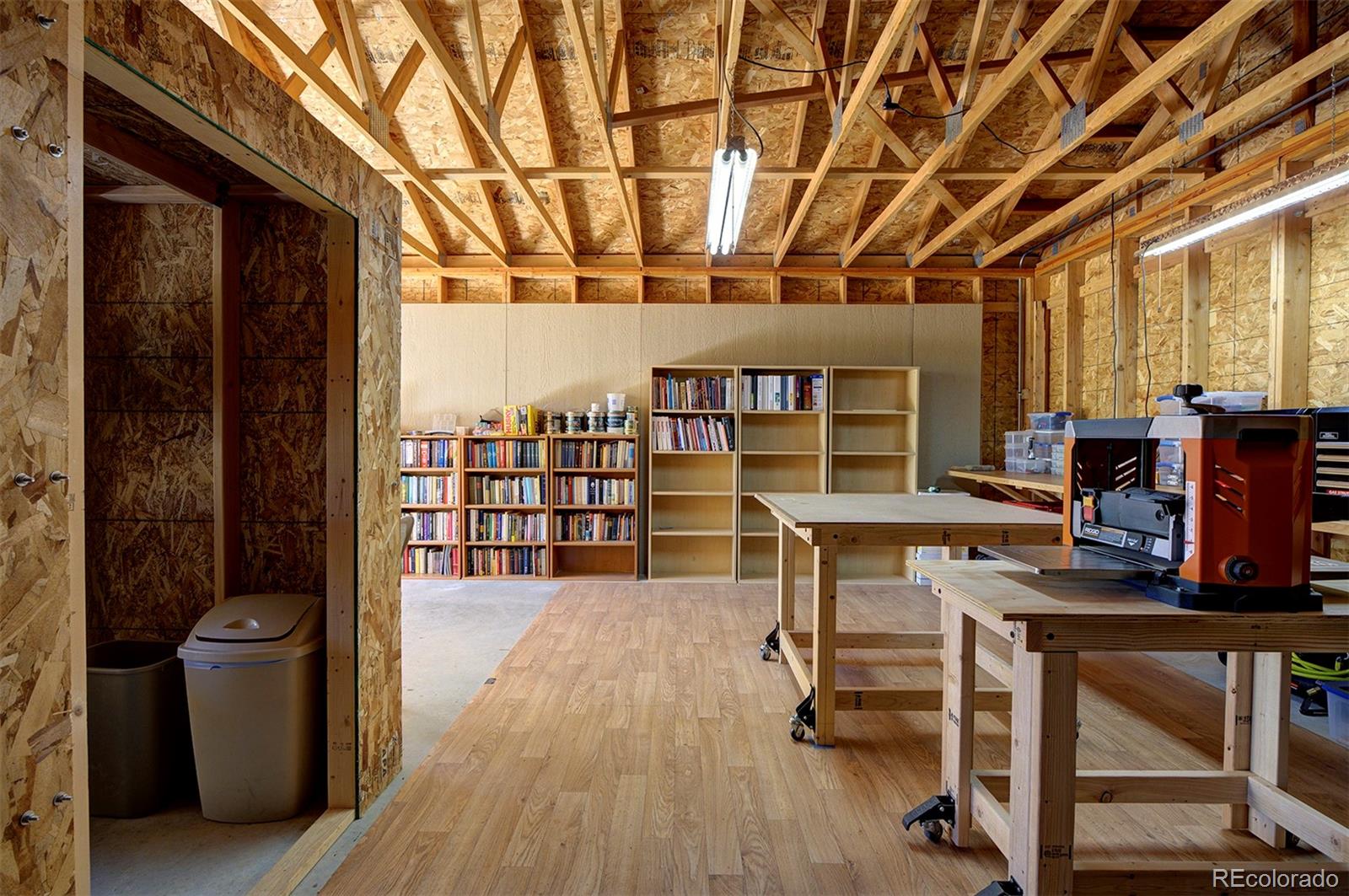 117 Tall Timber Lane Bailey, CO 80421 - Photo 28 of 37 a view of a workspace with furniture