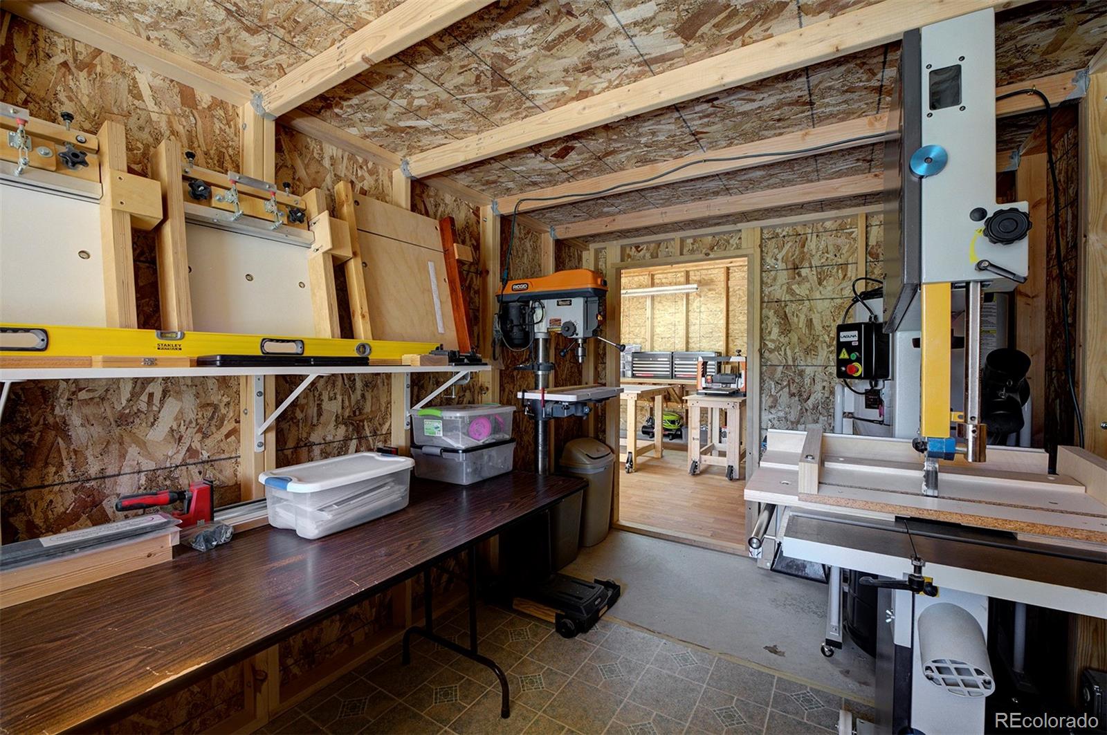 117 Tall Timber Lane Bailey, CO 80421 - Photo 29 of 37 a living room with furniture