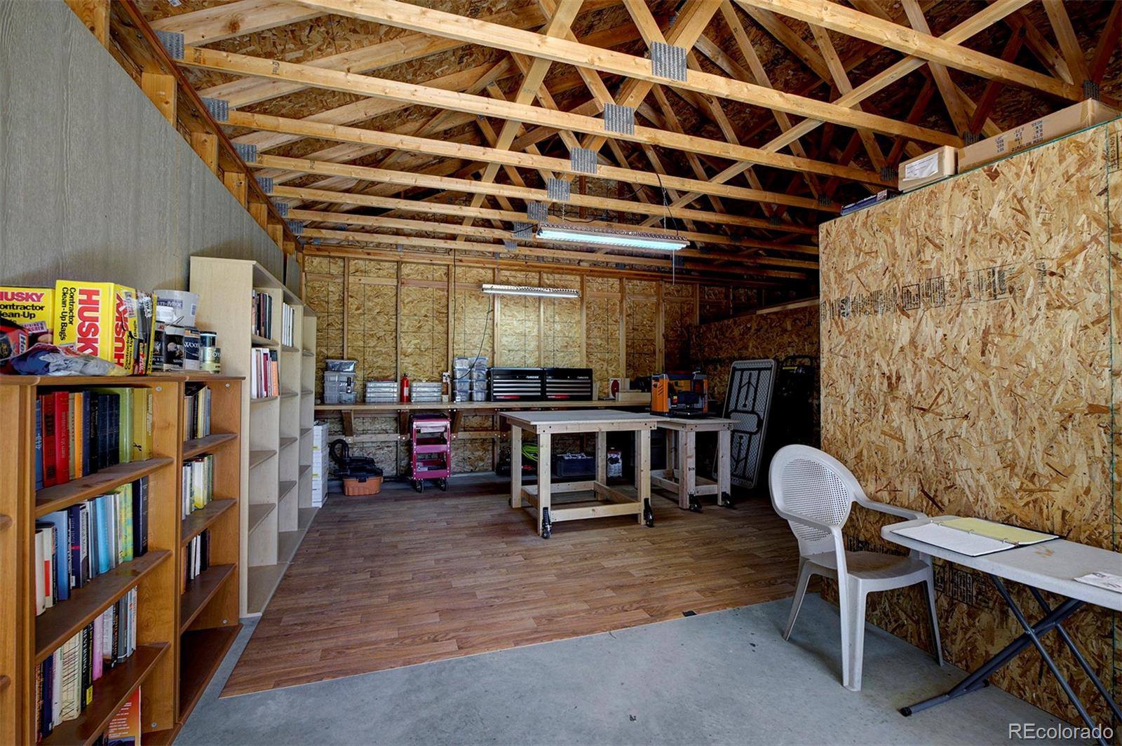 117 Tall Timber Lane Bailey, CO 80421 - Photo 34 of 37 a view of a room with shelves